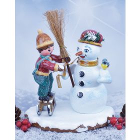 BOY MAKING SNOWMAN MINI FIGURINE FROM GERMANY